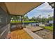A picturesque waterfront view from the back deck showcasing a canal and boat dock at 10922 Park Dr, Riverview, FL 33569