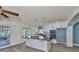 Modern kitchen features an island, stainless steel appliances, and sleek countertops at 10922 Park Dr, Riverview, FL 33569
