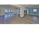 Open-concept living area features recessed lighting and access to the kitchen at 10922 Park Dr, Riverview, FL 33569