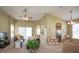 Spacious living room with an open floor plan, comfortable seating, and large windows at 11021 Silver Dancer Dr, Riverview, FL 33579