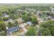 A beautiful home surrounded by mature trees and lush landscaping in a peaceful neighborhood setting at 11315 N Armenia Ave, Tampa, FL 33612