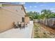 Spacious backyard featuring a seating area and privacy fence at 11315 N Armenia Ave, Tampa, FL 33612