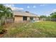 A fenced backyard provides outdoor living and entertaining space at 11315 N Armenia Ave, Tampa, FL 33612