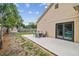 Backyard with a patio and outdoor dining set at 11315 N Armenia Ave, Tampa, FL 33612