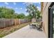 Spacious backyard featuring a seating area and privacy fence at 11315 N Armenia Ave, Tampa, FL 33612