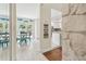 Light-filled dining area featuring a round table and chairs near the kitchen at 11315 N Armenia Ave, Tampa, FL 33612