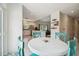 Charming kitchen area with seating, bright décor, and views to the main kitchen at 11315 N Armenia Ave, Tampa, FL 33612