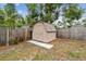 The backyard features a barn-style shed for additional storage at 11315 N Armenia Ave, Tampa, FL 33612