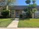 Charming single-story townhome featuring well-maintained landscaping and a welcoming entrance at 11511 113Th St # 5C, Largo, FL 33778