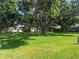 Expansive green space with mature trees, offering a peaceful and scenic environment at 11511 113Th St # 5C, Largo, FL 33778