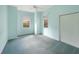 A versatile bedroom with plush carpeting, a double window, and a spacious closet at 12002 Hope Ln, Tampa, FL 33618