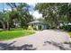 Brick paved circular driveway leading to the side-entry, two-car garage at 12002 Hope Ln, Tampa, FL 33618