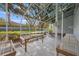 Bright, enclosed greenhouse with glass roof and work tables, perfect for cultivating plants year-round at 12002 Hope Ln, Tampa, FL 33618