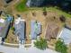 Overhead view displays well-maintained roofs, driveways, and landscaping among neighboring homes at 12119 Buffington Ln, Riverview, FL 33579