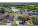 Beautiful single-Gathering home with an attached garage, serene lake view, and mature landscaping at 12119 Buffington Ln, Riverview, FL 33579
