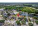 An aerial view of the houses in a picturesque community with a peaceful lake at 12119 Buffington Ln, Riverview, FL 33579