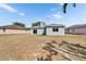 Wide-open backyard with space for entertaining and palm tree accents at 12119 Buffington Ln, Riverview, FL 33579