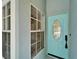 Attractive front door with decorative glass and black hardware, enhancing curb appeal at 12119 Buffington Ln, Riverview, FL 33579