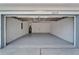 Garage with ample room for parking and storage, including a water heater at 12119 Buffington Ln, Riverview, FL 33579