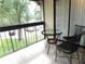 Balcony with outdoor seating, providing a relaxing space to enjoy the views at 124 Woodlake Wynde, Oldsmar, FL 34677