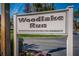 Entrance sign to Woodlake Run, a deed-restricted community offering a peaceful, no-soliciting environment at 124 Woodlake Wynde, Oldsmar, FL 34677