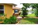 Cozy backyard featuring comfortable chairs, ideal for relaxing in the nature at 12407 Partridge Hill Row, Hudson, FL 34667