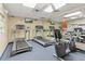 Well-equipped fitness center with treadmills and other cardio equipment at 12407 Partridge Hill Row, Hudson, FL 34667