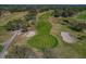 Scenic aerial of the golf course featuring lush green fairways and manicured greens at 12407 Partridge Hill Row, Hudson, FL 34667