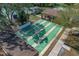 Overhead shot of the shuffleboard courts, an engaging community activity at 12407 Partridge Hill Row, Hudson, FL 34667