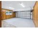 Spacious garage with modern lighting and coated floors, providing ample parking and work space at 1332 Marjohn Ave, Clearwater, FL 33756