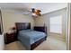 Comfortable bedroom featuring a ceiling fan and neutral carpet at 13338 Jaudon Ranch Rd, Dover, FL 33527