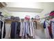 Walk-in closet featuring wire shelving for ample storage and organization at 13338 Jaudon Ranch Rd, Dover, FL 33527