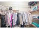 Walk-in closet with wire shelving and hanging rods, offering ample storage space at 13338 Jaudon Ranch Rd, Dover, FL 33527