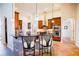Modern kitchen with granite countertops, stainless steel appliances, and breakfast bar at 13338 Jaudon Ranch Rd, Dover, FL 33527