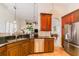 Well-appointed kitchen with stainless steel appliances and custom cabinetry at 13338 Jaudon Ranch Rd, Dover, FL 33527