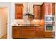 Modern kitchen with granite countertops and stainless steel appliances at 13338 Jaudon Ranch Rd, Dover, FL 33527
