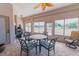 Enclosed patio with brick floors and outdoor seating at 13338 Jaudon Ranch Rd, Dover, FL 33527