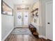 Charming foyer featuring patterned tile flooring, stylish decor, and a chandelier at 1447 Stetson Dr, Wesley Chapel, FL 33543