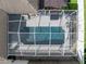 Aerial close up showcases a screened-in pool with patio furniture creating a relaxing outdoor oasis at 1447 Stetson Dr, Wesley Chapel, FL 33543