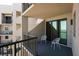 Balcony with two chairs and views of the inter-coastal waterway and the city at 1600 Gulf Blvd # 1112, Clearwater Beach, FL 33767