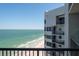 Balcony view of the shoreline and beach, with views to the north at 1600 Gulf Blvd # 1112, Clearwater Beach, FL 33767