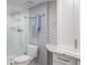 Well-appointed bathroom features a glass-door shower, modern toilet, and decorative tile at 1600 Gulf Blvd # 1112, Clearwater Beach, FL 33767