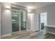 Bedroom featuring a desk, closet, sliding glass doors, and a view to the office/loft area at 1600 Gulf Blvd # 1112, Clearwater Beach, FL 33767