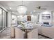 Elegant dining area with a chandelier, modern furnishings, and plenty of natural light at 1600 Gulf Blvd # 1112, Clearwater Beach, FL 33767
