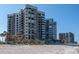 Elegant beachfront condo complex with private balconies offering stunning ocean views at 1600 Gulf Blvd # 1112, Clearwater Beach, FL 33767