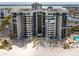 Luxury beachfront condo features stunning views, a pristine beach, and lush landscaping at 1600 Gulf Blvd # 1112, Clearwater Beach, FL 33767