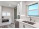 Kitchen with stainless steel sink and appliances, geometric backsplash, and ocean view at 1600 Gulf Blvd # 1112, Clearwater Beach, FL 33767