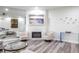 Cozy living room showcasing stylish decor, a fireplace, and ample seating at 1600 Gulf Blvd # 1112, Clearwater Beach, FL 33767