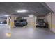 Well-lit parking garage with designated parking spaces for a secure and organized community at 1600 Gulf Blvd # 1112, Clearwater Beach, FL 33767