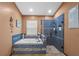 Bright bathroom showcasing a luxurious soaking tub and a frameless glass shower at 18631 Le Dauphine Pl, Lutz, FL 33558